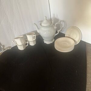 Elegant White Tea Set with Teapot and Cups